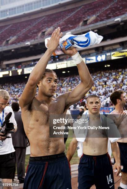 The United States' Oguchi Onyewu celebrates the win over the Honduras team in the Gold Cup semifinal at Giants Stadium. After being outplayed for...