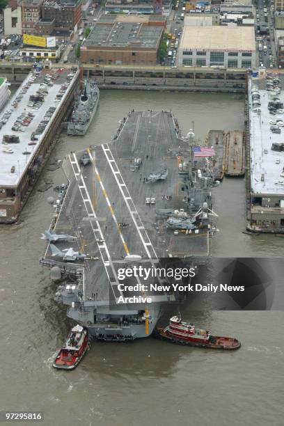 The USS John F. Kennedy docks at Pier 88 on the Hudson River after its arrival in New York for the 18th Annual Fleet Week celebration taking place...