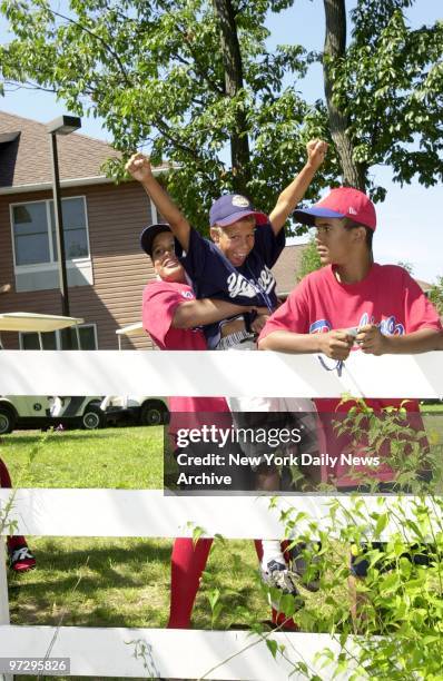 Francisco Pena, Aaron James and Hector Rodriguez of the Rolando Paulino All-Stars relax on a day off in the Little League World Series at...