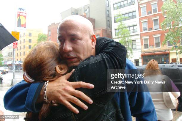 Francisco Villafane is comforted after funeral services for his brother, Eleodoro Villafane, at the Church of the Nativity on Second Ave. Villafane,...