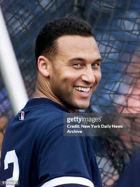 Shortstop Derek Jeter flashes a big smile at the New York Yankees' spring training camp in Tampa.