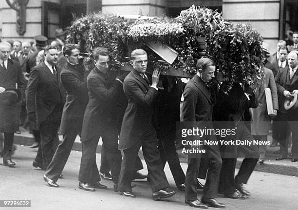 Casket of Harry Houdini being carried to hearse.