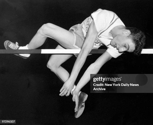 Frank Carroll of LaSalle Military Academy clears the bar during CHSAA's 28th annual track and field championships at Madison Square Garden.