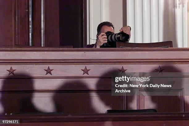 Silhouette of Representatives speaking in Washington on the House Intelligence Committee report on Chinese spying after copies of the unclassified...