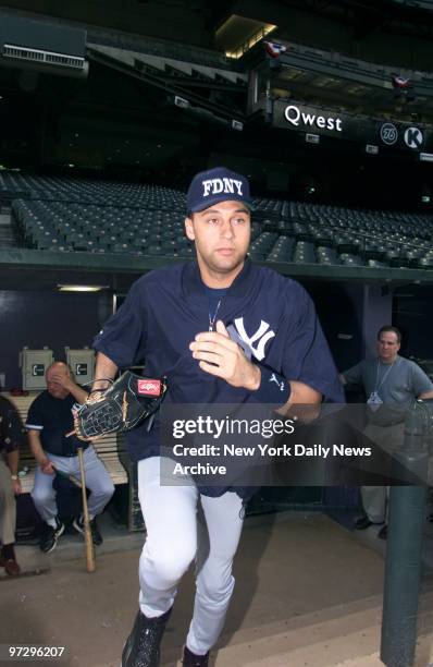New York Yankees' infielder Derek Jeter takes the field for practice at Bank One Ballpark in Phoenix, Ariz., on the day before Game 1 of the World...