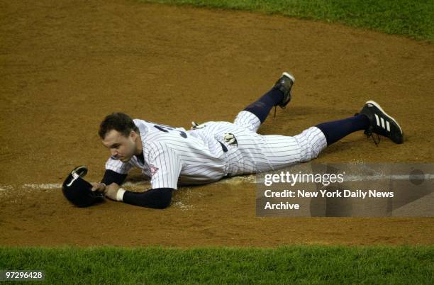 New York Yankees' infielder Nick Johnson reacts after he was picked off at third base to end the third inning of Game 1 of the World Series against...