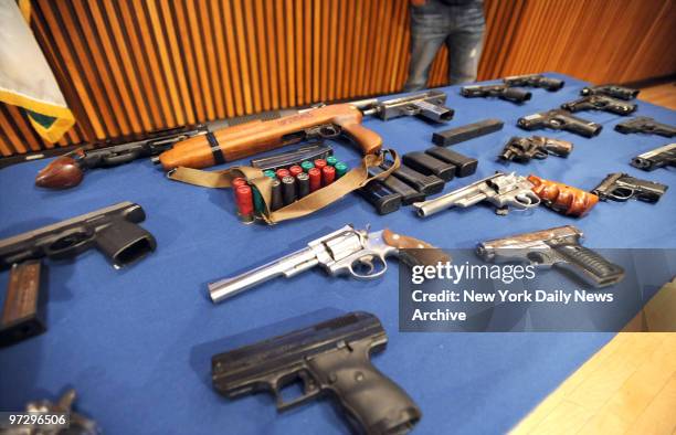 New York City Police Commissioner Raymond Kelly show weapons seized in bust of a Virginia-to-New York gun ring.