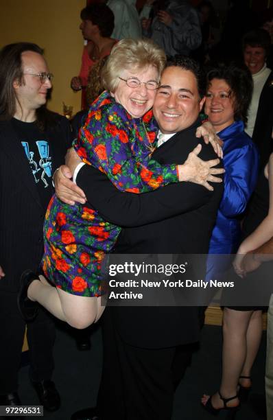 New York City Police Officer Daniel Rodriquez lifts up Dr. Ruth Westheimer at party at Lure celebrating the release of his new CD.