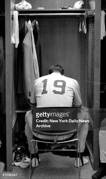 New York Yankees' Jack McDowell sits dejected in the lockeroom after the Mariners came back to beat them in the 11th inning 6-5.