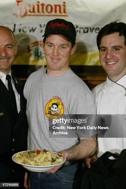 The winner and Past King of the FDNY is... Irish. Robert Norris of Ladder 161 in Coney Island holds his winning dish in the Buitoni/Fire Department...