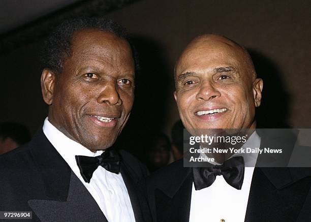 Sidney Poitier and Harry Belafonte get together at a University of the West Indies gala honoring Poitier at the Marriott Marquis Hotel.