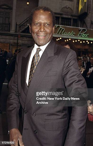 Sidney Poitier attending opening of Broadway play "Jekyll and Hyde" at Plymouth Theatre.