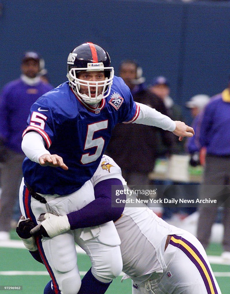 New York Giants' quarterback Kerry Collins gets off pass as 
