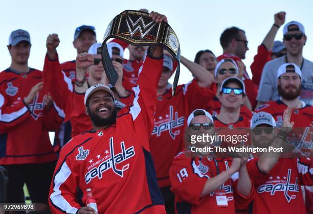 Washington Capitals right wing Devante Smith-Pelly holds his championship belt as the Stanley Cup champions Washington Capitals hold their victory...