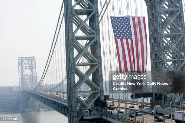 The world's largest free-flying American flag hangs from the George Washington Bridge on the weekend before the fifth anniversary of the Sept. 11...