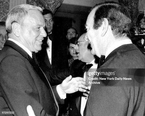 Frank Sinatra and Gov. Hugh Carey are in close harmoney during fund-raiser at Waldorf Astoria.