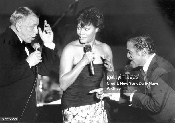 Frank Sinatra and Sammy Davis Jr., join Dionne Warwick aboard Intrepid.