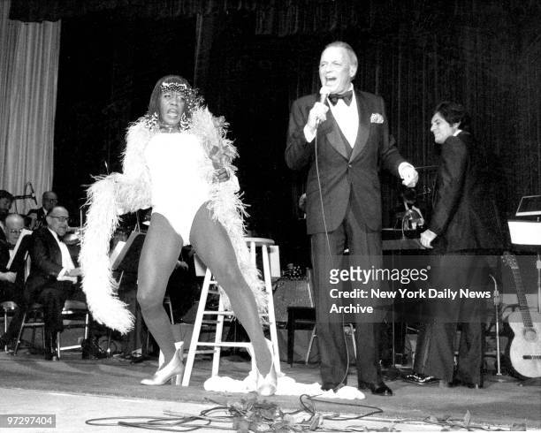 Frank Sinatra belts out "The Lady is a Tramp" and Geraldine refuses to let a feather boa constrict her on stage at the Waldorf-Astoria. Sinatra was...