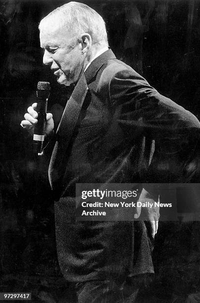 Frank Sinatra complains about his backache during a performance at Byrne Arena in the Meadowlands.