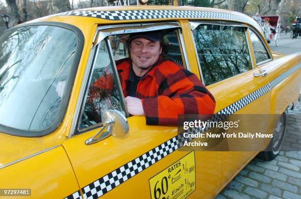 New York Yankees' Jason Giambi sits in a taxi in Central Park, where he is filming scenes for the miniseries "The Bronx is Burning." He plays the...