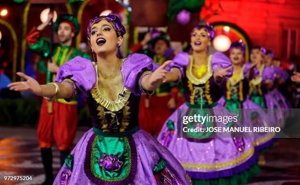 Dancers perform during the Santo Antonio de Lisboa's Parade on Avenida da Liberdade, in Lisbon on June 12, 2018. - Lisbon celebrates Saint Anthony's...