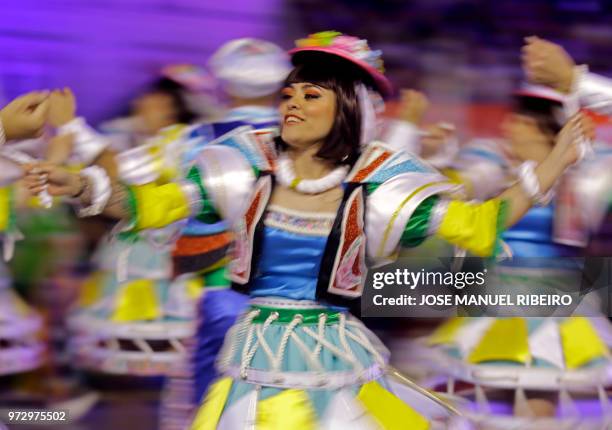 Dancers perform during the Santo Antonio de Lisboa's Parade on Avenida da Liberdade, in Lisbon on June 12, 2018. - Lisbon celebrates Saint Anthony's...