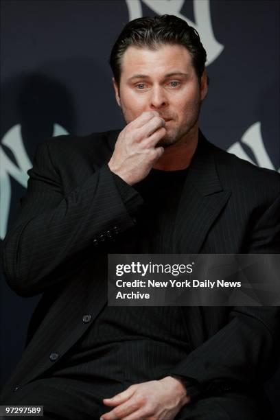 New York Yankees' Jason Giambi speaks to reporters during a news conference at Yankee Stadium. In Giambi's first statement to the media since he was...