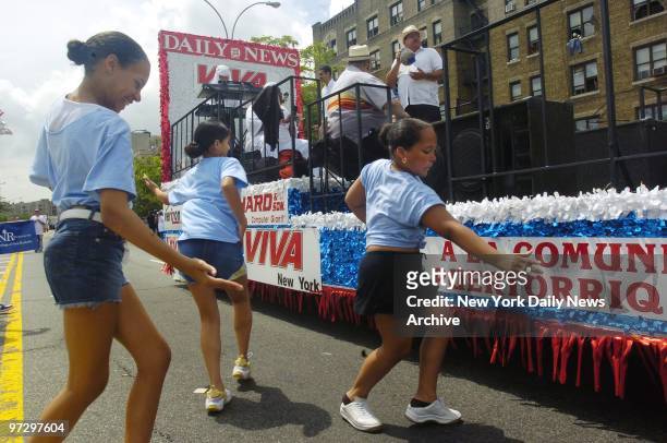 Chelsea Molina Ilene Perez and Essence Delgado make a dream team as the members of Dancers Dreamzzz step out alongside the Daily News float at the...