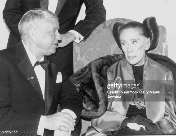 Frank Sinatra joins Martha Graham at the Martha Graham Dance Company opening night gala at the Plaza Hotel.