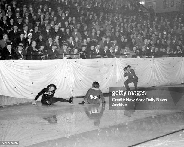 Silver Skates at Madison Square Garden. Not the way to win a race. Ellen Swanson , accompanied by Henrietta Premier, takes to the slippery slide. The...