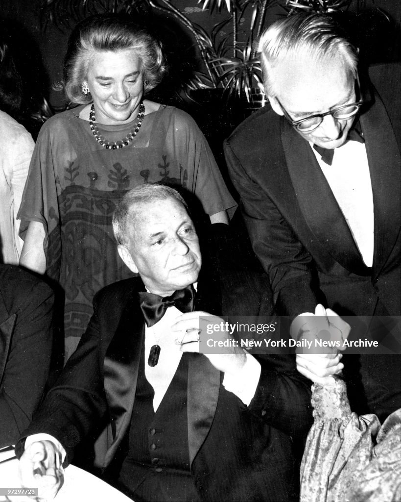 Frank Sinatra with Happy Rockefeller and Laurance Rockefelle