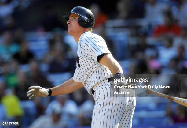 New York Yankees' John Flaherty watches as the ball heads over the left field fence for a solo homer in the second inning against the Tampa Bay Devil...