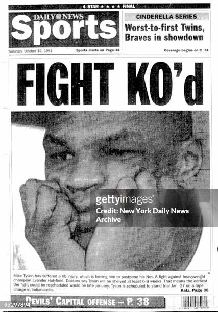 New York Daily News back page October 19 FIGHT KO'd, story on Mike Tyson postponing fight against heavyweight champion Evander Holyfield., Mike Tyson.