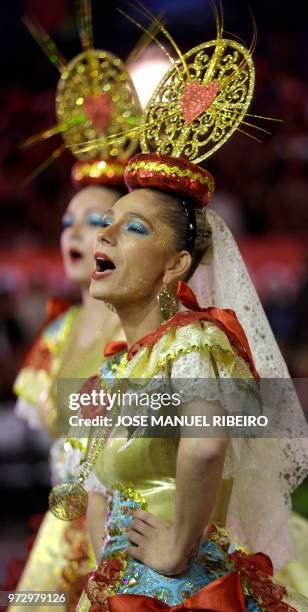 Dancers perform during the Santo Antonio de Lisboa's Parade on Avenida da Liberdade, in Lisbon on June 12, 2018. - Lisbon celebrates Saint Anthony's...