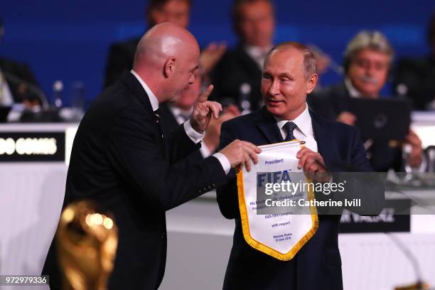 President of Russia, Vladimir Putin and FIFA President Gianni Infantino during the 68th FIFA Congress at the Moscow Expocentre on June 13, 2018 in...