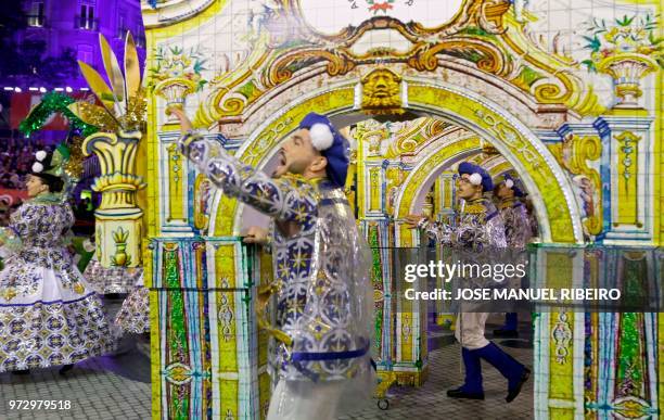 Dancers perform during the Santo Antonio de Lisboa's Parade on Avenida da Liberdade, in Lisbon on June 12, 2018. - Lisbon celebrates Saint Anthony's...