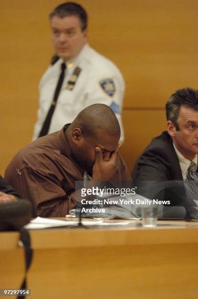 Marlon Legere , who was found guilty on Feb. 2 of the Sept. 2004 shooting deaths of NYPD detectives Robert Parker and Patrick Rafferty, rubs his eyes...
