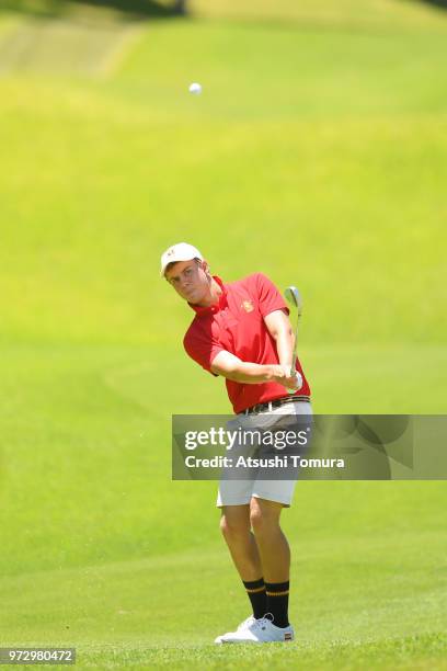 Eduard Rousaud Sabate of Spain chips onto the 18th green during the second round of the Toyota Junior Golf World Cup at Chukyo Golf Club on June 13,...