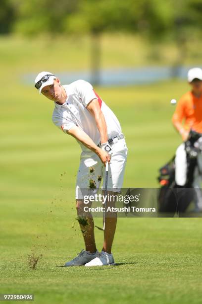 Rasmus Hojgaard of Denmark hits his third shot on the 9th hole during the second round of the Toyota Junior Golf World Cup at Chukyo Golf Club on...