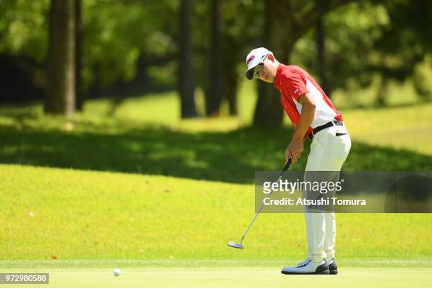 Keita Nakajima of Japan putts on the 16th hole during the second round of the Toyota Junior Golf World Cup at Chukyo Golf Club on June 13, 2018 in...