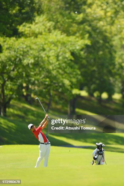 Kosuke Suzuki of Japan hits his second shot on the 9th hole during the second round of the Toyota Junior Golf World Cup at Chukyo Golf Club on June...