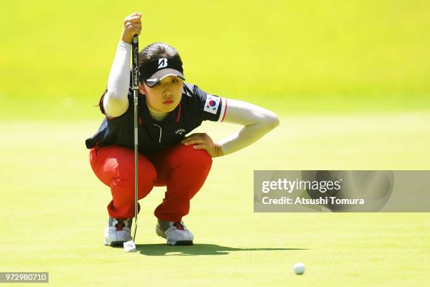 Sujeong Lee of South Korea lines up her putt on the 16th hole during the second round of the Toyota Junior Golf World Cup at Chukyo Golf Club on June...