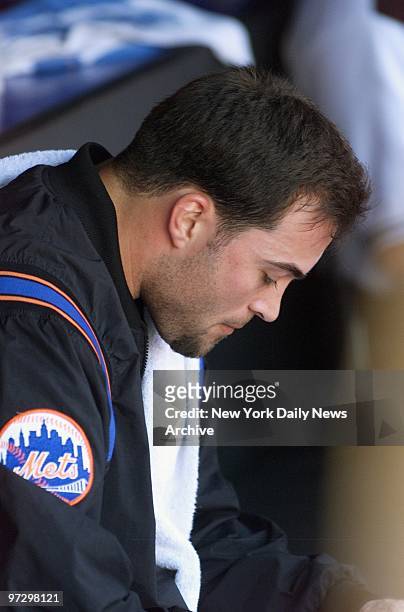 Things don't look good to New York Mets' pitcher Mike Hampton as he sits in the dugout with his team trailing 1-0 despite eight innings of good...