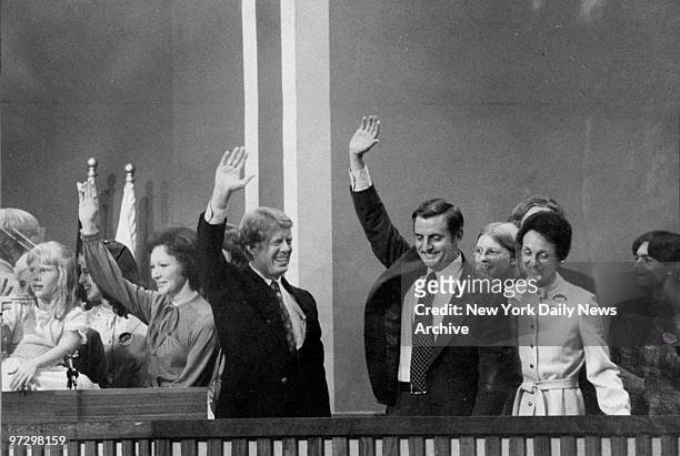 Jimmy and Rosalynn Carter with Walter and Joan Mondale wave to delegates after Carter and Mondale were nominated to run for President and Vice...