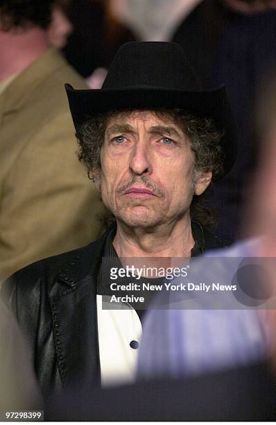 Singer Bob Dylan is settled in his ringside seat before the start of the Felix Trinidad - William Joppy WBA middleweight title bout at Madison Square...