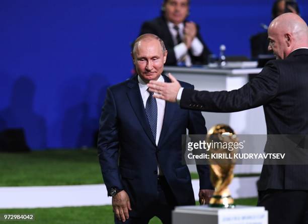 President Gianni Infantino and Russian President Vladimir Putin attend the 68th FIFA Congress at the Expocentre in Moscow on June 13, 2018.