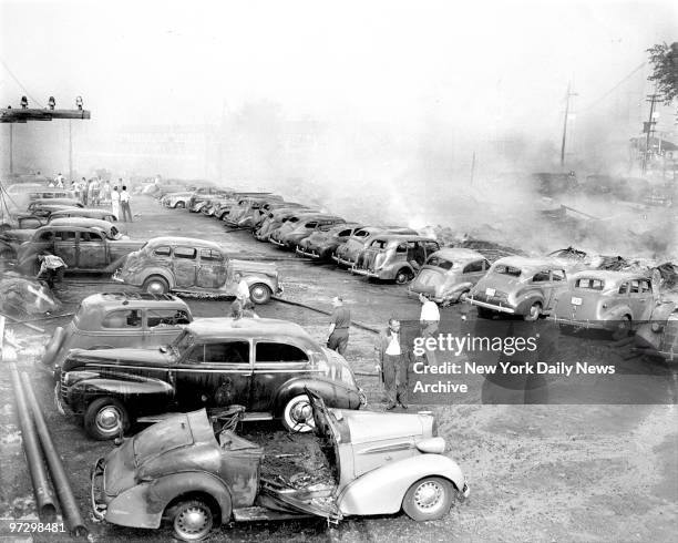These are some of 200 cars going up in smoke that swept Palisades Amusement Park, N.J., opposite 125th St., Manhattan. Tougher still, one jalopy...