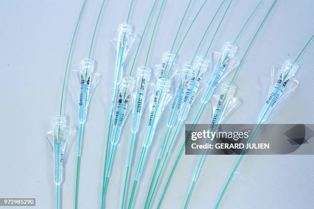 This picture taken on June 7, 2018 in the production unit of stents and catheters of the BALT company in Montmorency shows catheters. Since it was...