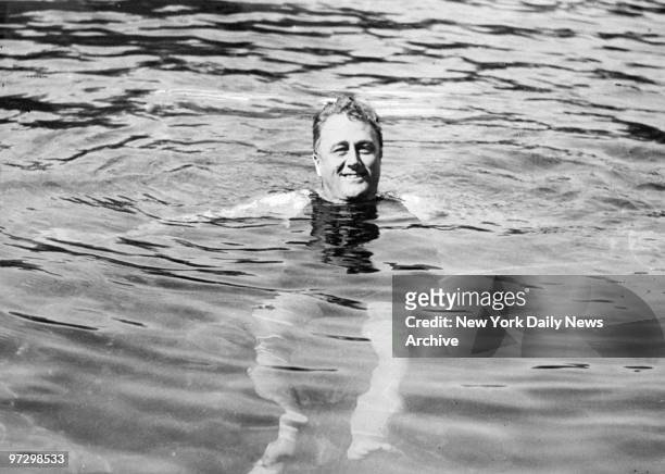 Franklin D. Roosevelt swimming in Warm Springs, Ga.