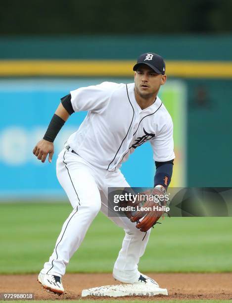 Jose Iglesias of the Detroit Tigers looks for the ball during the fifth inning of the game against the Cleveland Indians at Comerica Park on June 10,...